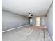 Large bedroom with neutral gray walls, plush carpeting, a ceiling fan, and access to the en suite at 2001 Laurel Village Cir, Belmont, NC 28012