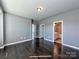 Spacious bedroom with dark hardwood flooring and neutral gray walls at 2001 Laurel Village Cir, Belmont, NC 28012
