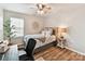 Charming bedroom featuring a comfortable bed, soft lighting, and a cozy ambiance for restful nights at 2005 Grimley Ln, Fort Mill, SC 29707