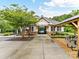 The community clubhouse offers a secure entry with a pool and outdoor eating area at 2005 Grimley Ln, Fort Mill, SC 29707