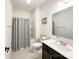 Classic bathroom with a combination shower and tub, white vanity, and neutral tones at 2048 Turnsberry Dr, Monroe, NC 28112
