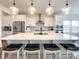 Bright kitchen with stainless steel appliances, a spacious island with seating, and ample counter space at 2048 Turnsberry Dr, Monroe, NC 28112