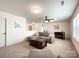 Inviting living room featuring a sectional sofa and tasteful decor, creating a warm and welcoming atmosphere at 2048 Turnsberry Dr, Monroe, NC 28112