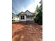 Home under construction displays the foundation, framing, and initial stages of exterior finishing, on an ample lot at 208 Malvern Sw Dr, Concord, NC 28025