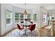 Charming breakfast nook featuring a round table, natural light, and backyard views at 20812 Decora Dr, Cornelius, NC 28031
