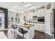 Spacious kitchen featuring an island, stainless steel appliances, granite countertops, and hardwood flooring at 21610 Rio Oro Dr, Cornelius, NC 28031