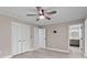 Bedroom with light gray floors, white closets, and views to the en-suite bathroom at 2632 Montford Nw Ave, Concord, NC 28027