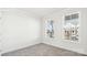 Bright bedroom with two windows and neutral carpeting, creating a calm and serene space at 279 Miramar Dr, York, SC 29745