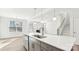 Kitchen island with stainless steel appliances, white countertops, and pendant lighting at 279 Miramar Dr, York, SC 29745