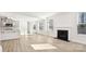 Bright living area featuring a fireplace and a door leading to the exterior at 279 Miramar Dr, York, SC 29745