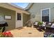 Relaxing backyard deck with outdoor furniture, grilling area, and inviting ambiance at 303 N Main N St, Granite Quarry, NC 28146