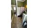This bathroom features an outdoor view, a shower/bath, and unique fixtures at 303 N Main N St, Granite Quarry, NC 28146