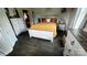 Inviting bedroom with hardwood floors, neutral walls, and comfortable furniture and decor at 303 N Main N St, Granite Quarry, NC 28146