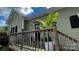 Stairway leading to the home's entrance and outdoor décor at 303 N Main N St, Granite Quarry, NC 28146