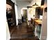 Charming kitchen features rustic wood details, barstool seating, and modern pendant lighting at 303 N Main N St, Granite Quarry, NC 28146