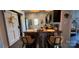 The kitchen features a bar with chairs and a sliding barn door at 303 N Main N St, Granite Quarry, NC 28146
