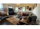 Cozy living room with stylish furniture, decor, and lots of natural light at 303 N Main N St, Granite Quarry, NC 28146