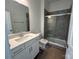 Bathroom with a modern vanity and a tiled shower at 3121 Beacon Heights Rd, Indian Land, SC 29707