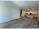 Spacious living room leading to the kitchen, ready for customization and personal touches at 3121 Beacon Heights Rd, Indian Land, SC 29707