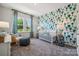 A charming ' bedroom with a whimsical hot air balloon wallpaper and natural light at 3123 Beacon Heights Rd, Indian Land, SC 29707