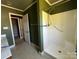 Bathroom with a walk in shower, and a view into the closet and an adjacent bedroom at 3240 St Vincent Dr, Claremont, NC 28610