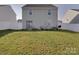 Spacious backyard with lush grass and a white fence, perfect for outdoor activities and privacy at 3322 Brighton Dr, Gastonia, NC 28052