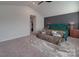 Bedroom featuring an accent wall, vaulted ceilings, and plush throw on the bed at 3322 Brighton Dr, Gastonia, NC 28052