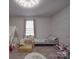 Lovely bedroom with cute decor, a comfortable bed, and a cozy play area, perfect for children at 3322 Brighton Dr, Gastonia, NC 28052