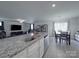 Island sink with stainless dishwasher, granite countertops and open floor plan at 3322 Brighton Dr, Gastonia, NC 28052