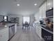Spacious kitchen with stainless appliances, granite countertops and tiled backsplash at 3322 Brighton Dr, Gastonia, NC 28052