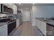 Spacious kitchen with stainless appliances, granite countertops and tiled backsplash at 3322 Brighton Dr, Gastonia, NC 28052