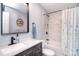 Modern bathroom features marble-look tile in the shower and sleek fixtures at 3623 Braden Dr, Charlotte, NC 28216