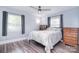 Bright and spacious bedroom with wood-look flooring and modern furnishings at 3623 Braden Dr, Charlotte, NC 28216