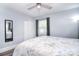 This bedroom features wood-look flooring, white closet doors, and natural light at 3623 Braden Dr, Charlotte, NC 28216