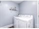 Convenient laundry room featuring a modern washer and dryer set at 3623 Braden Dr, Charlotte, NC 28216