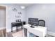 Well-lit home office features a modern desk setup and keyboard at 3623 Braden Dr, Charlotte, NC 28216