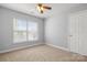 Comfortable bedroom with standard closet, window, and ceiling fan, providing an optimal living space at 4004 Shasta Cir, Clover, SC 29710