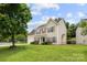 Exterior view of home with beautiful lawn and mature trees at 4004 Shasta Cir, Clover, SC 29710