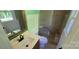 Updated bathroom showcasing a tile shower and granite countertop at 401 Pamela St, Gastonia, NC 28054