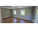 Bright bedroom with hardwood floors, neutral walls, and natural light, a clean and versatile space at 401 Pamela St, Gastonia, NC 28054