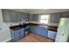 Functional kitchen featuring wood countertops, neutral cabinets, and stainless steel appliances at 401 Pamela St, Gastonia, NC 28054