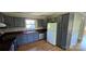 Traditional kitchen with gray cabinets, butcher block countertops and stainless steel appliances at 401 Pamela St, Gastonia, NC 28054