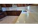 Close-up view of a kitchen, featuring quartz countertops and stainless steel appliances at 401 Pamela St, Gastonia, NC 28054