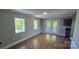 Living room featuring recessed lighting, hardwood floors and a french door entrance at 401 Pamela St, Gastonia, NC 28054