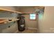Utility room featuring a hot water tank, some shelving and a window at 401 Pamela St, Gastonia, NC 28054