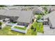 Aerial view of a brick home with fenced yard, patio, and well-maintained lawn at 4028 Woodsmill Rd, Fort Mill, SC 29707