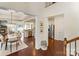 Open concept features dining, kitchen, and living areas with hardwood floors and recessed lighting at 4028 Woodsmill Rd, Fort Mill, SC 29707
