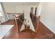 Beautiful staircase with hardwood floors and railing offering an inviting view of the home at 4028 Woodsmill Rd, Fort Mill, SC 29707