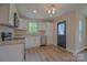 Modern kitchen features granite countertops, stainless steel appliances, and durable flooring at 407 Chambers St, Statesville, NC 28677