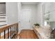 Inviting entryway with wood flooring, a cozy bench, and natural light from a window at 434 Breezewood Dr, Belmont, NC 28012